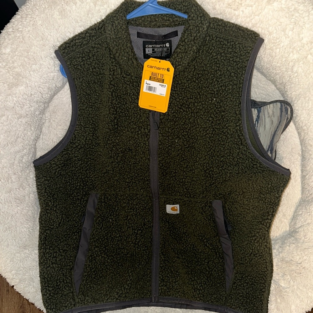 Dark green Carhartt faux sherpa vest